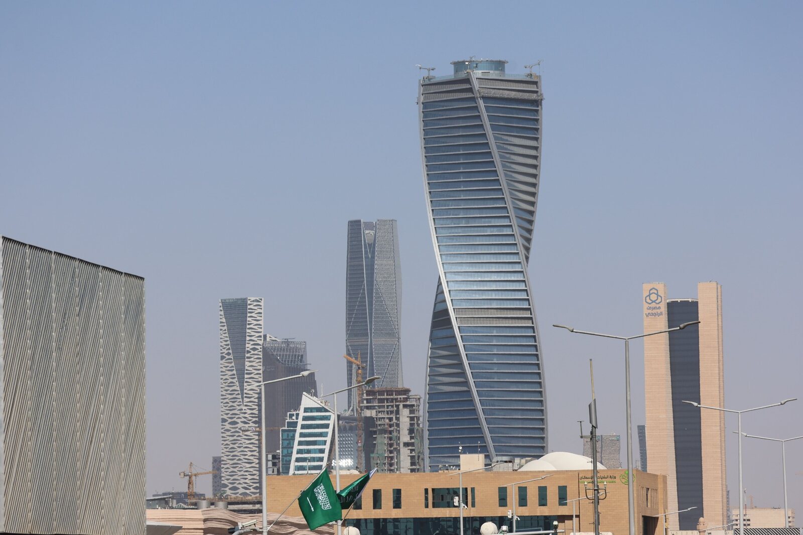 Riyadh skyline and Saudi flags